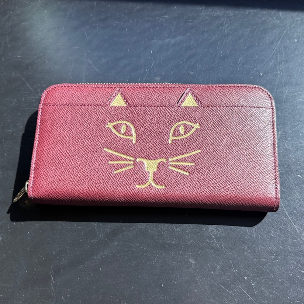 Charlotte Olympia wallet, made in Italy.